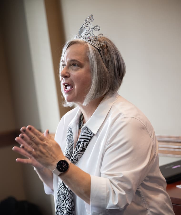 Rita Thomas speaking with energy at a workshop